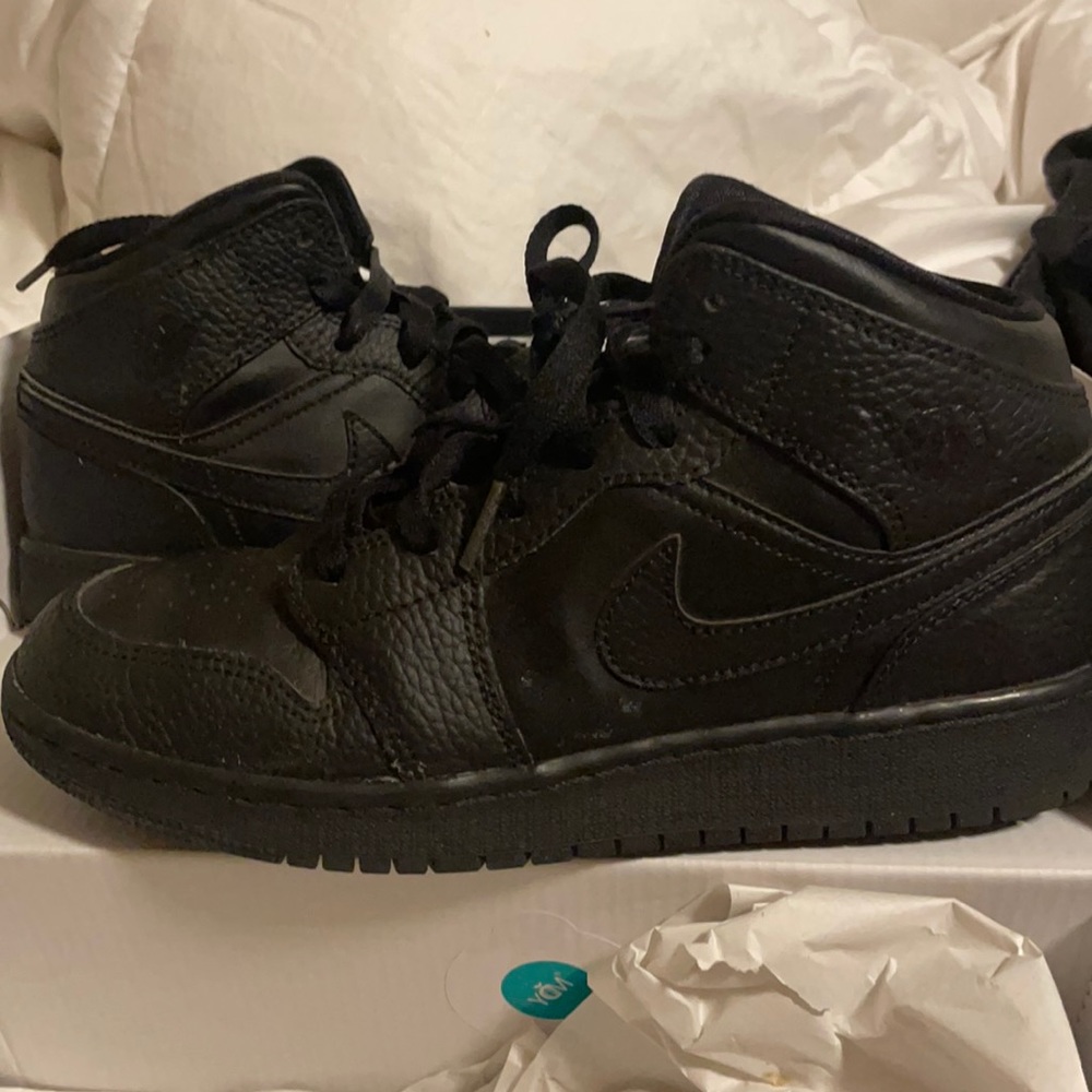 All black Jordan ones